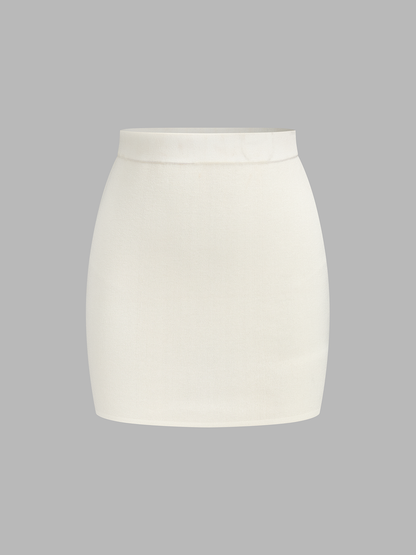 Conjunto de Top de Capa Assimétrica em Malha & Saia Mini