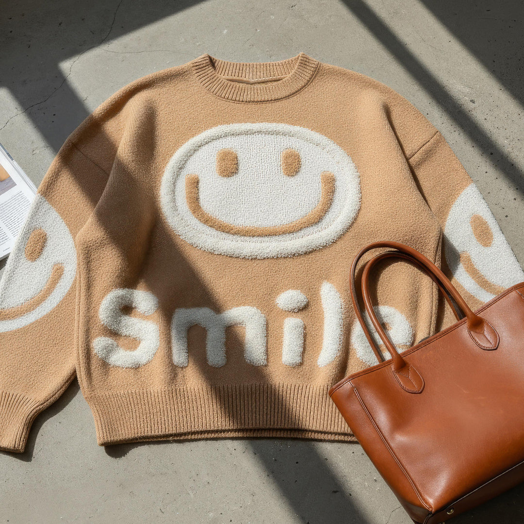 Suéter oversized com estampa de sorriso fofo
